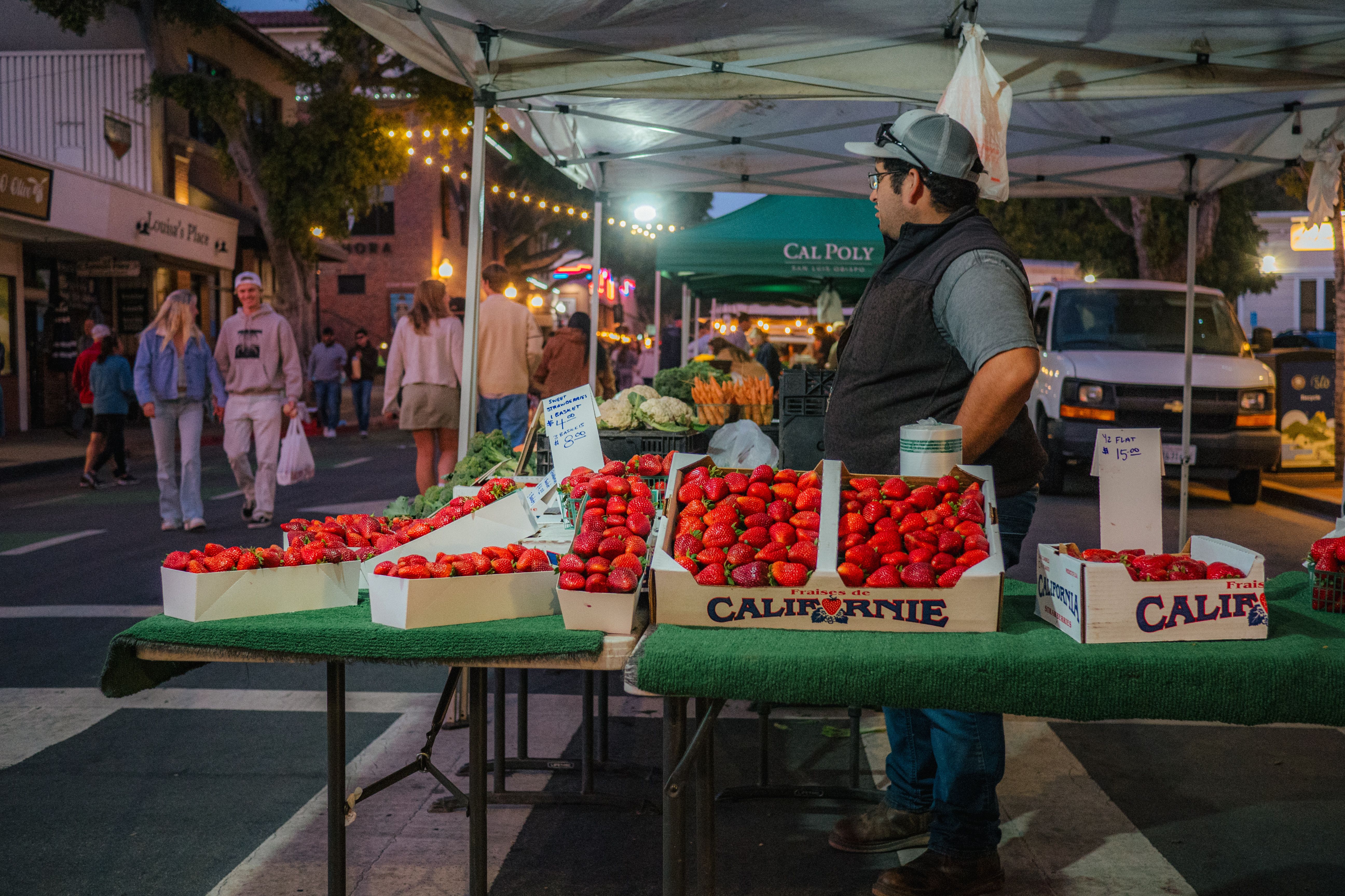 Colorful local farmers market with fresh produce and a lively community atmosphere
